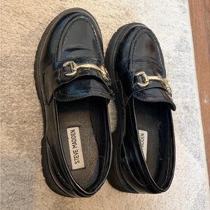 Steve Madden Glossy Black Loafers with Gold Accent